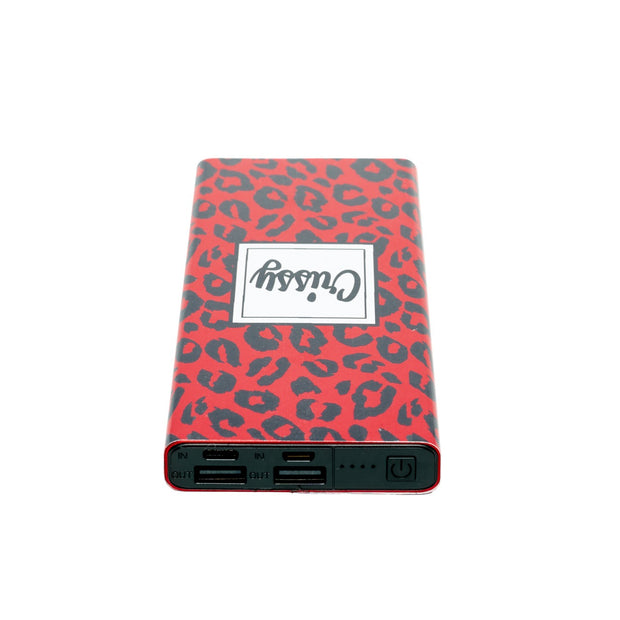 Red Leopard Power Bank laying on side
